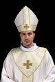 Mitra ecru z haftowanym krzyżem na tkaninie żakardowej - LE/9075/05 - HAF LE/9075/05 - Dewocjonalia P.H. Jakóbczak - Katolicki sklep liturgiczny i hurtownia