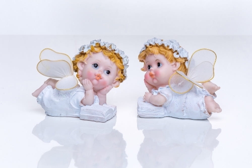  Aniołek bobas leżący z książką