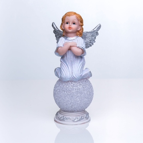  Aniołek na świecącej kuli